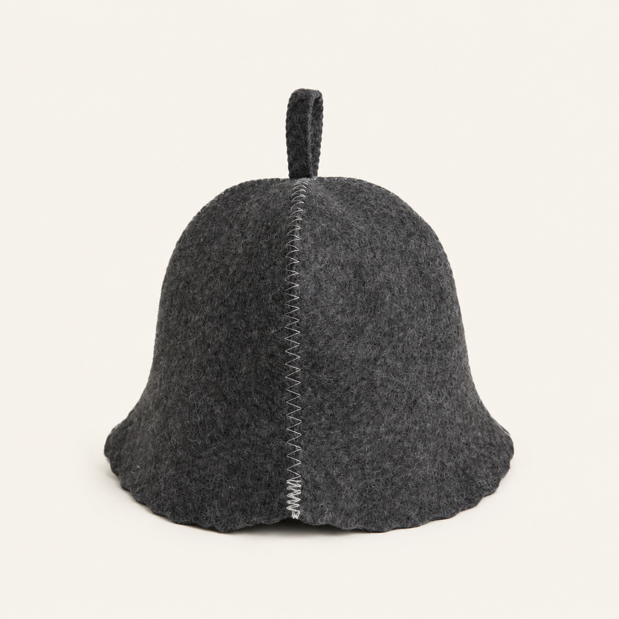 Charcoal gray felt sauna hat with a pale stitched seam, without lettering