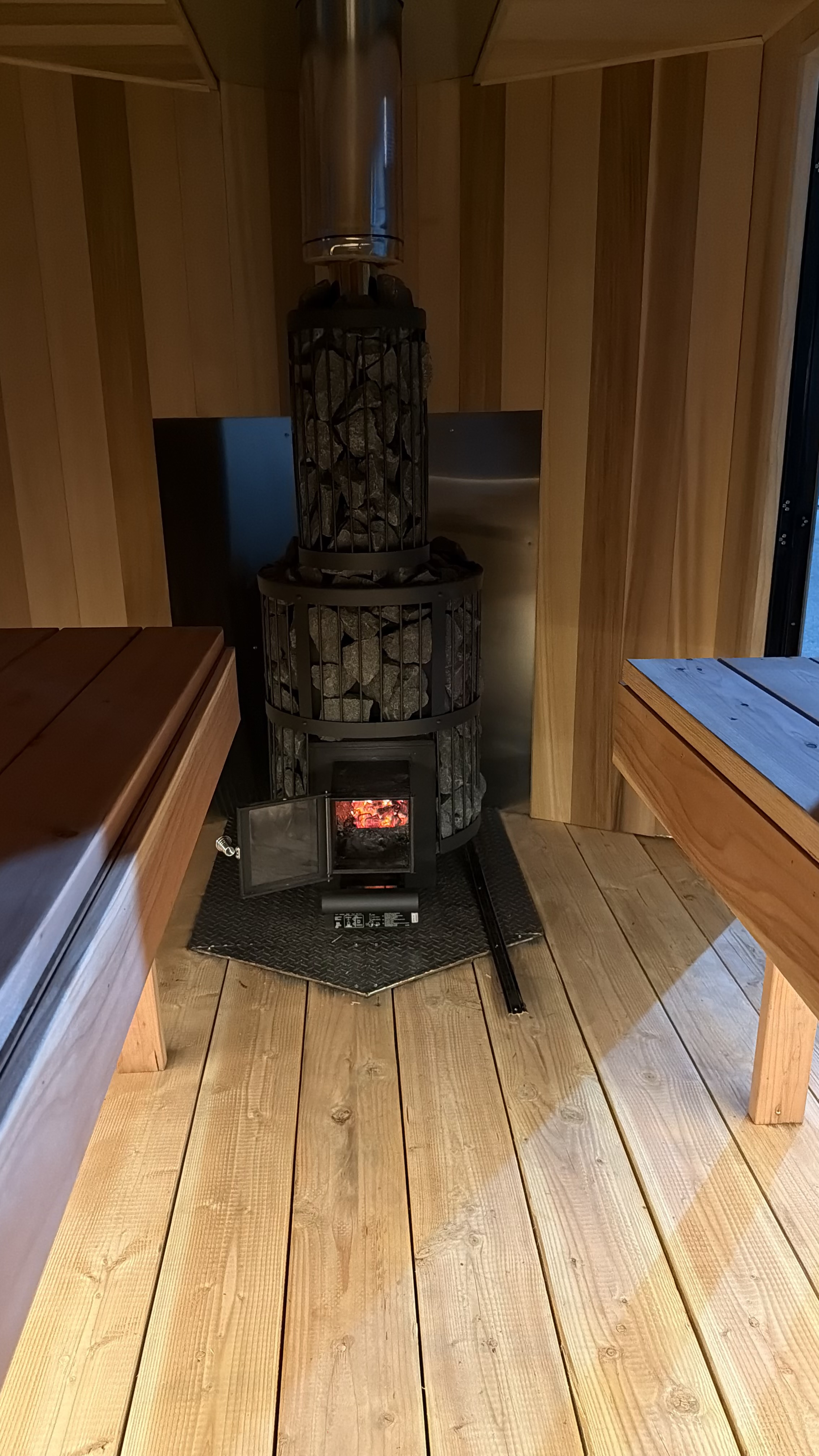Large stone-filled wood-fired sauna stove